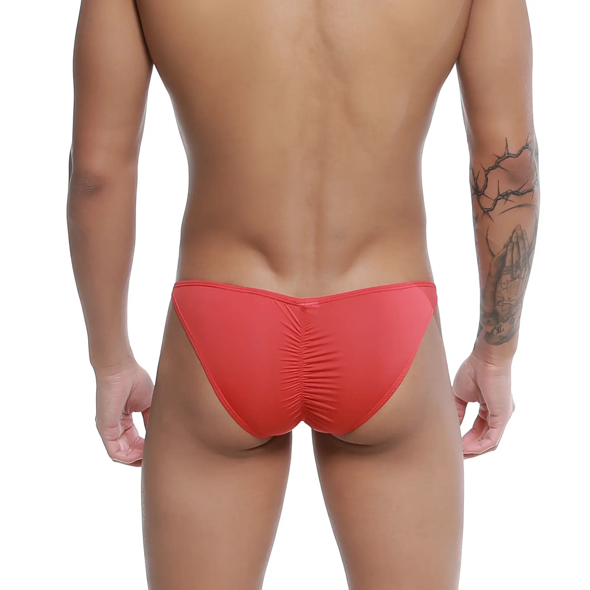 Red form-fitting swim trunks with ruched back design from u-station me bikini collection visible from the back side