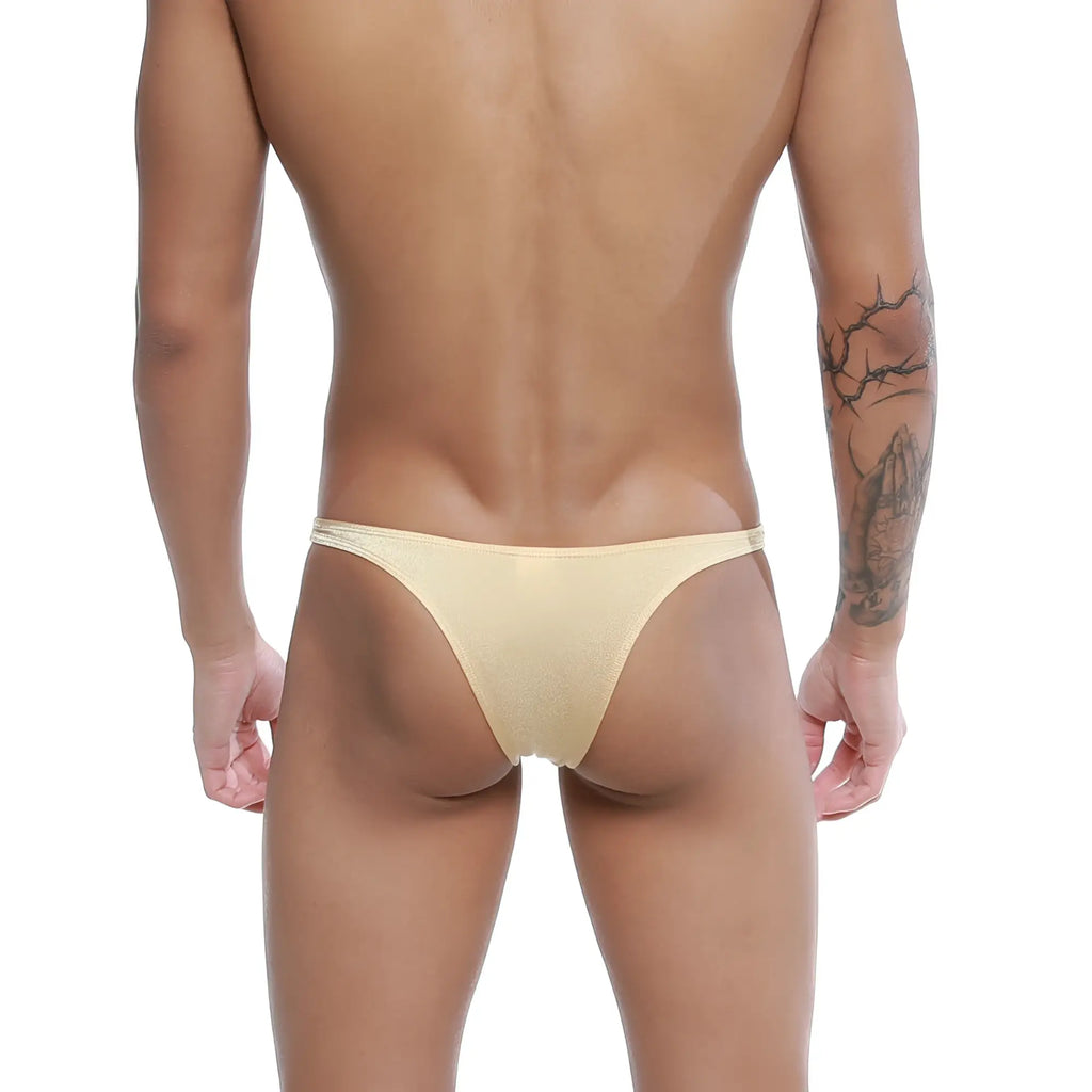 Beige sheer mesh thong with subtle shimmer from u-station dream bikini gold u0002-710, front view