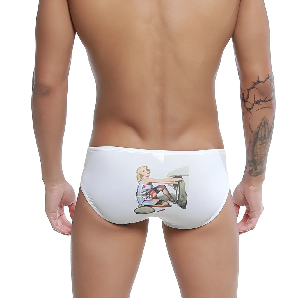 White swim trunks with vintage blonde woman in retro racing outfit on classic car wheel u station repair bikini u0022-111
