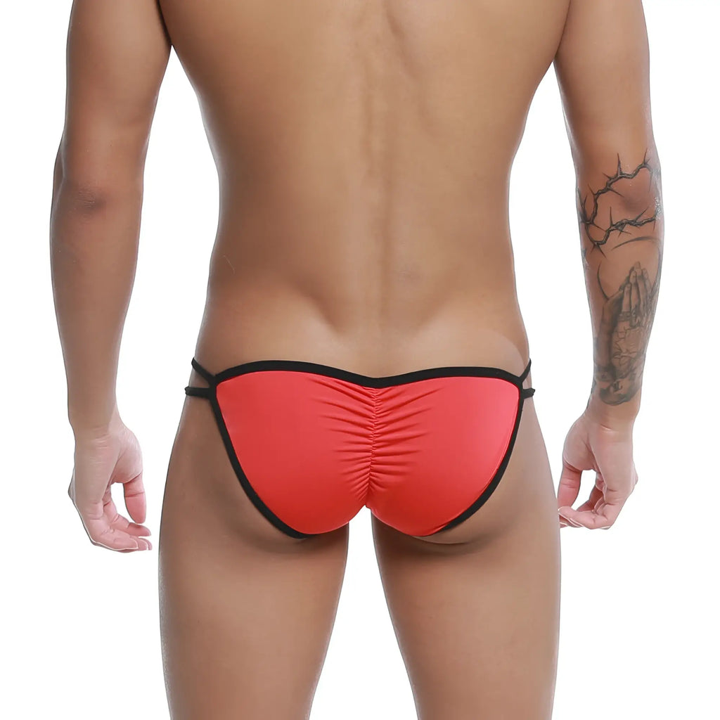 Back side of red and black u-station skeleton bikini thong with ruched back and elastic waistband