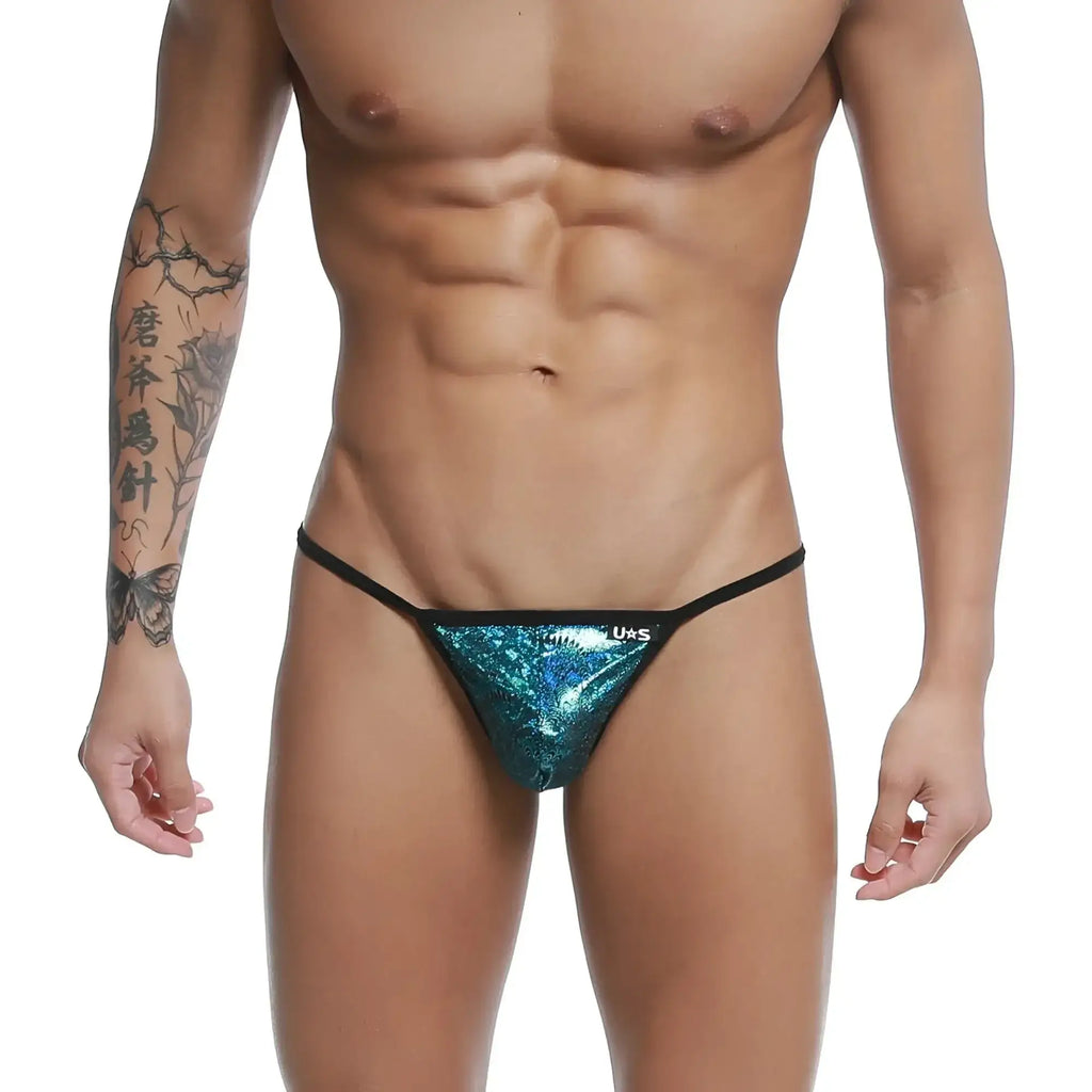 Shiny teal sequined u-station string thong with black trim showing front view in blue peacock color