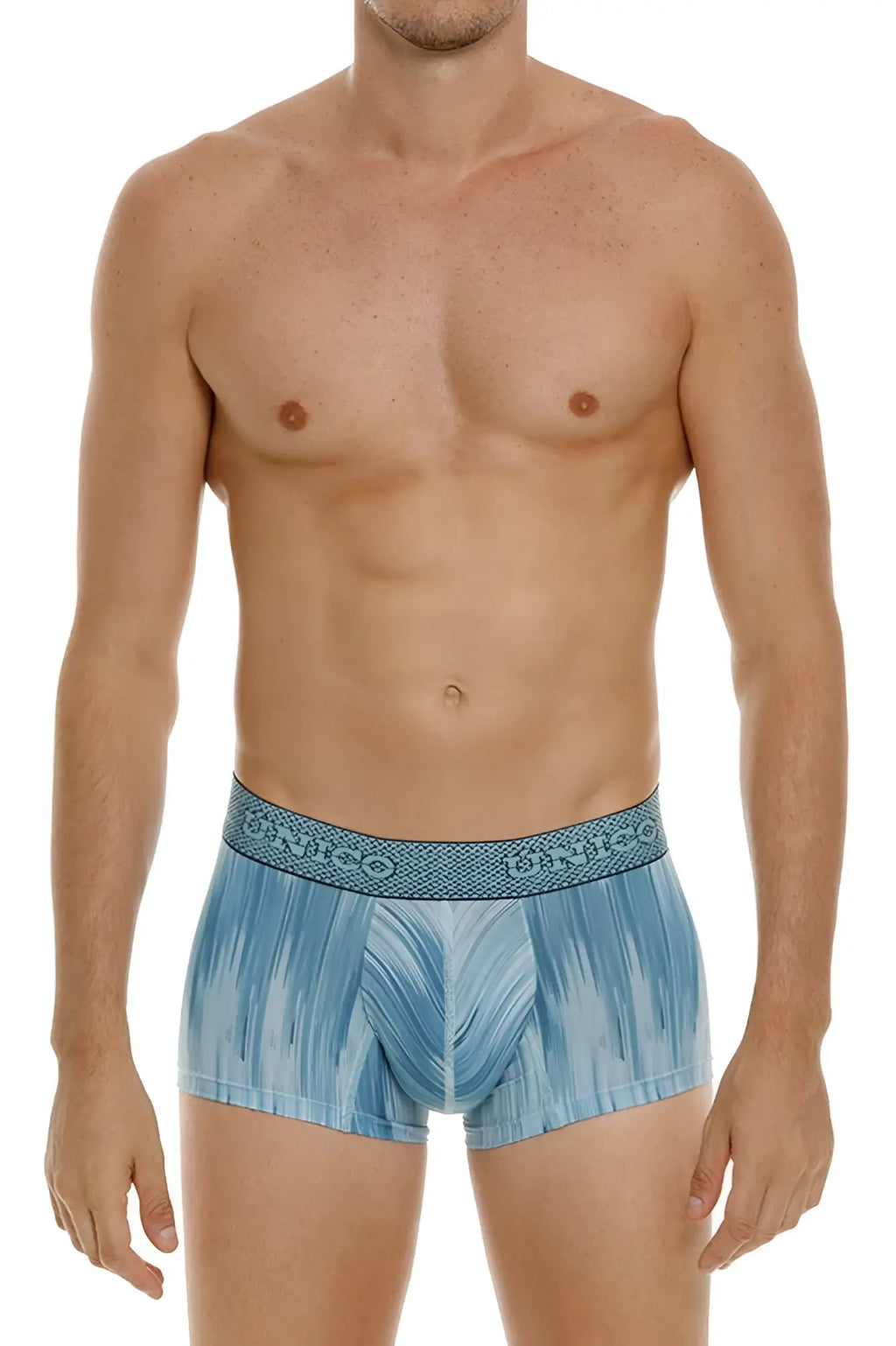 Light blue patterned unico 24080100112 hilada trunks with textured waistband and unico brand name in blue color