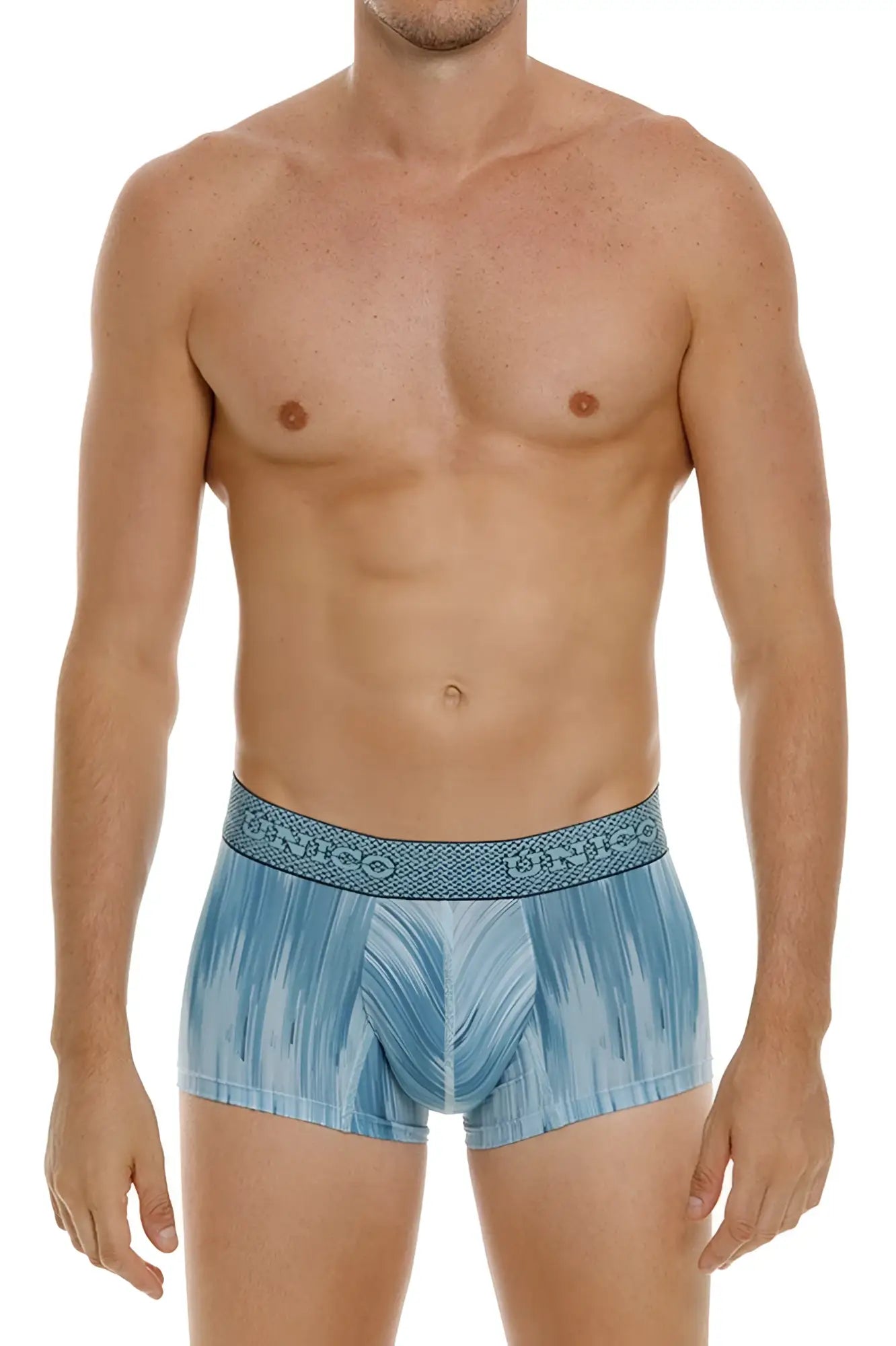 Light blue patterned unico 24080100112 hilada trunks with textured waistband and unico brand name in blue color