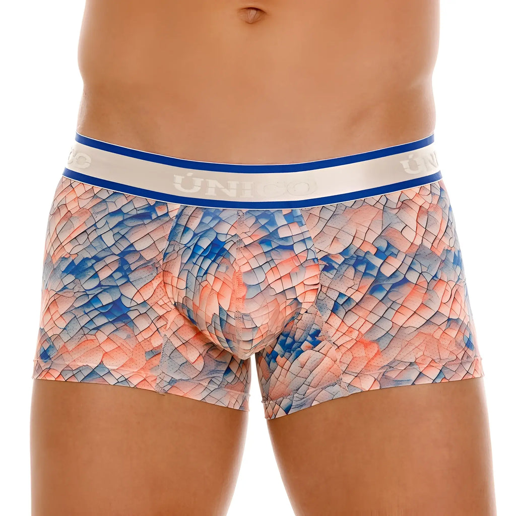 Blue and coral patterned Unico Aforo trunks with white elastic waistband and unhoo branding in multi-colored design