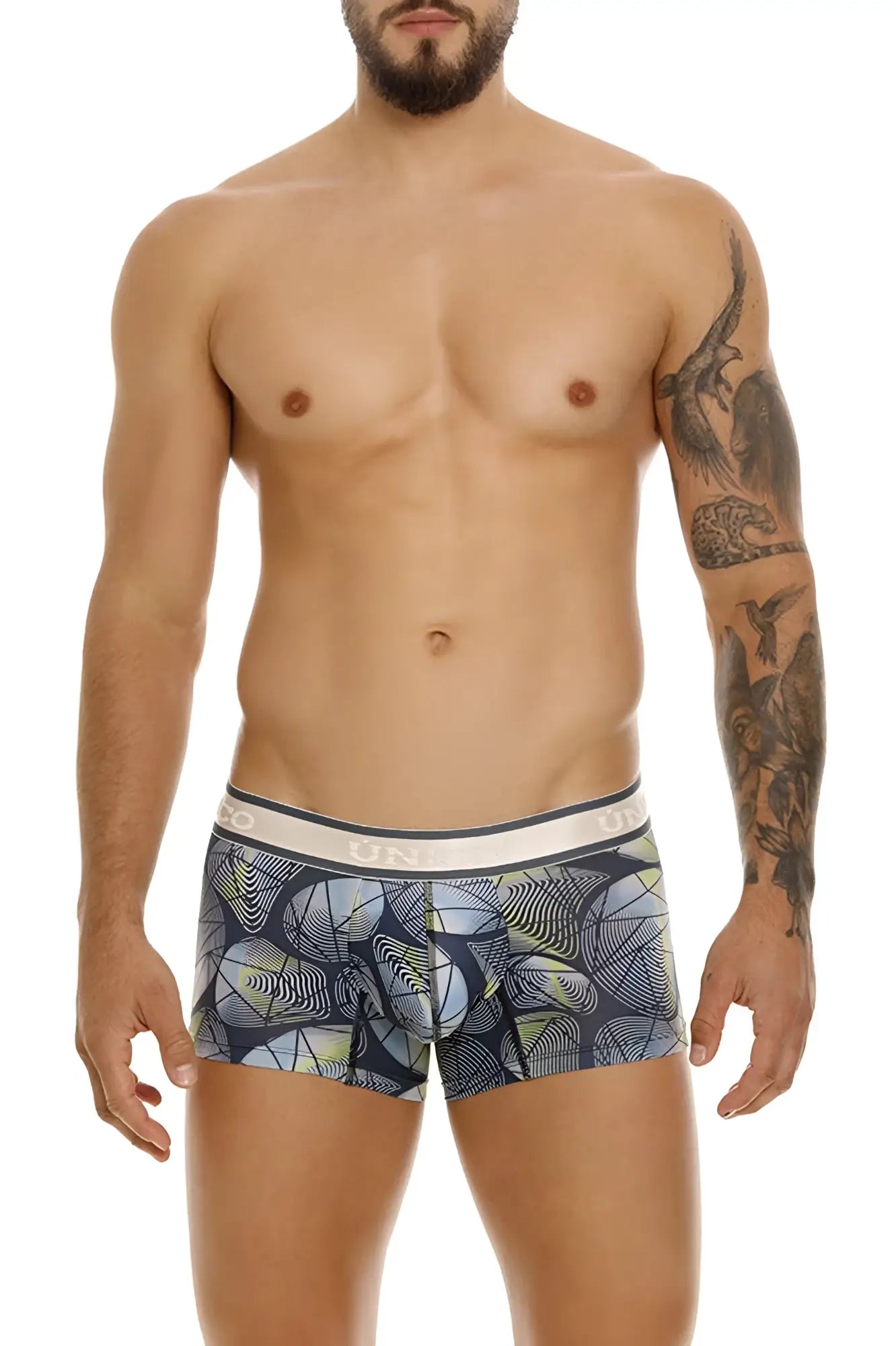 Men’s unico resplandecer trunks in gray with dark blue gray abstract geometric pattern and white elastic waistband