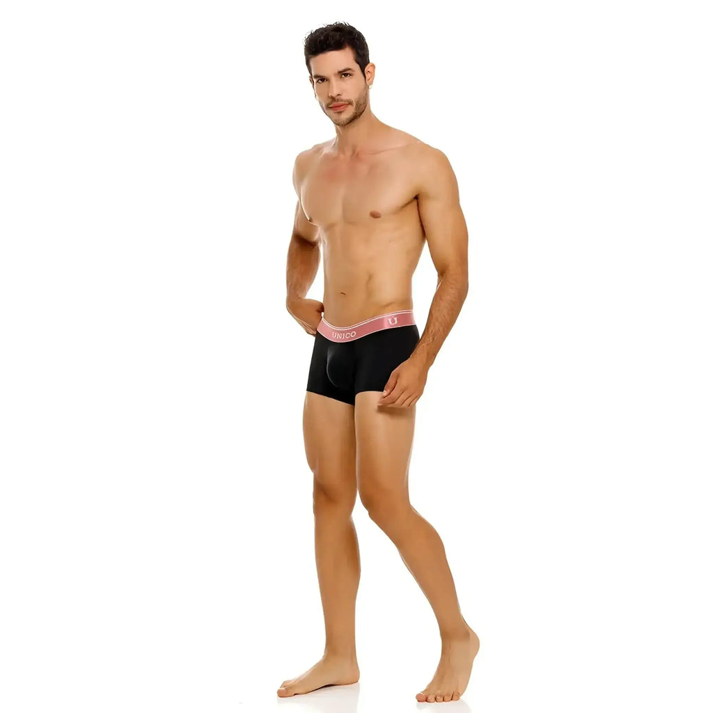 Black unico 24110100108 oro rosa trunks with pink waistband and dunco white lettering