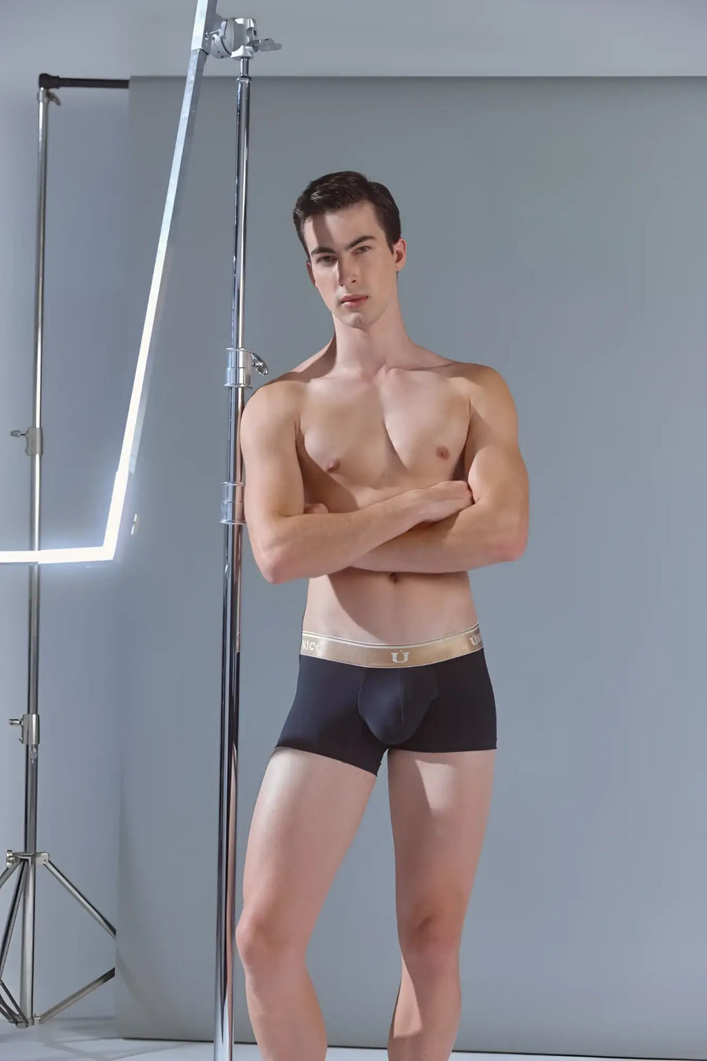 Black unico 24110100110 lingote trunks with gold waistband and brand logo in front for comfortable wear