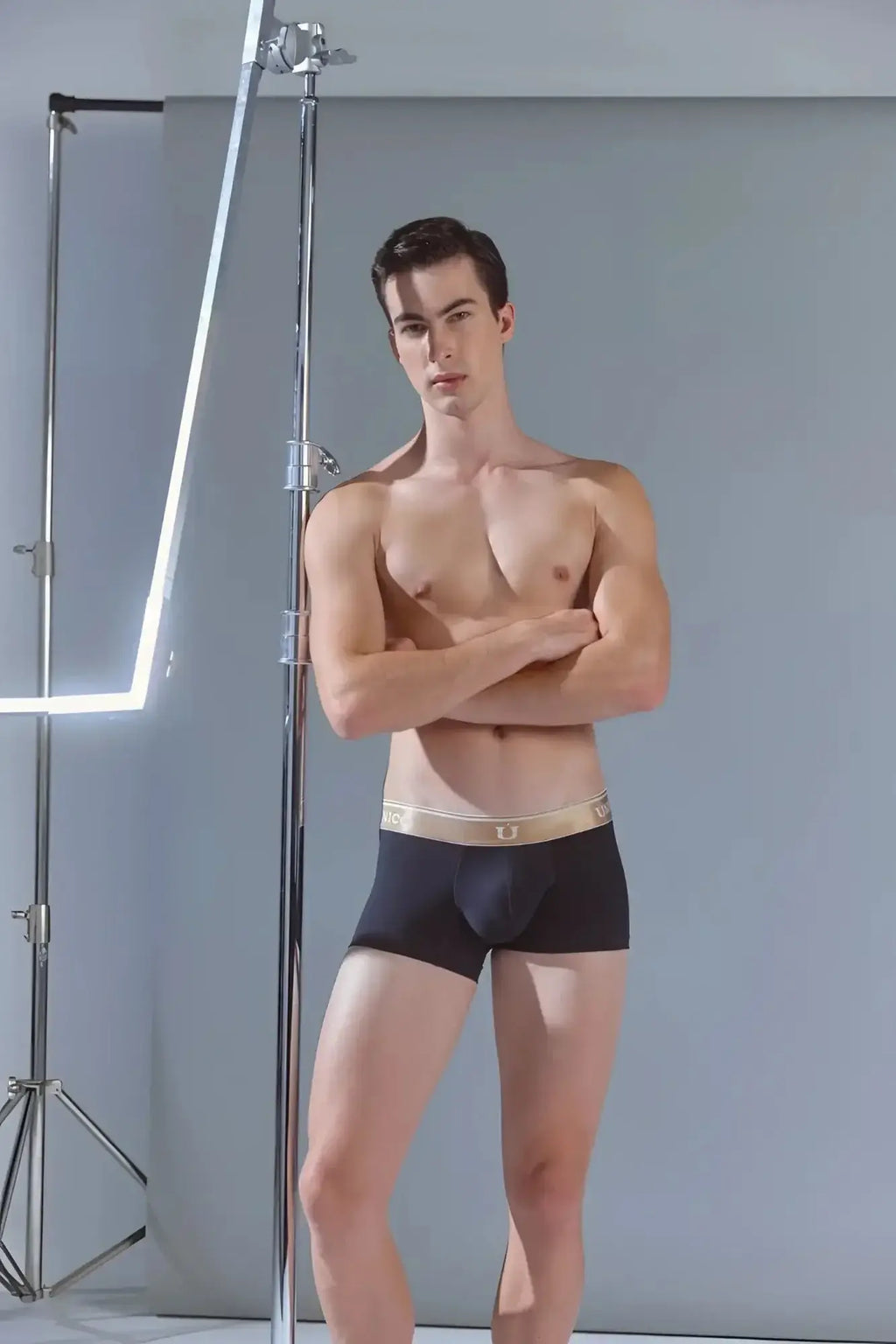 Black unico 24110100110 lingote trunks with gold waistband and brand logo in front for comfortable wear