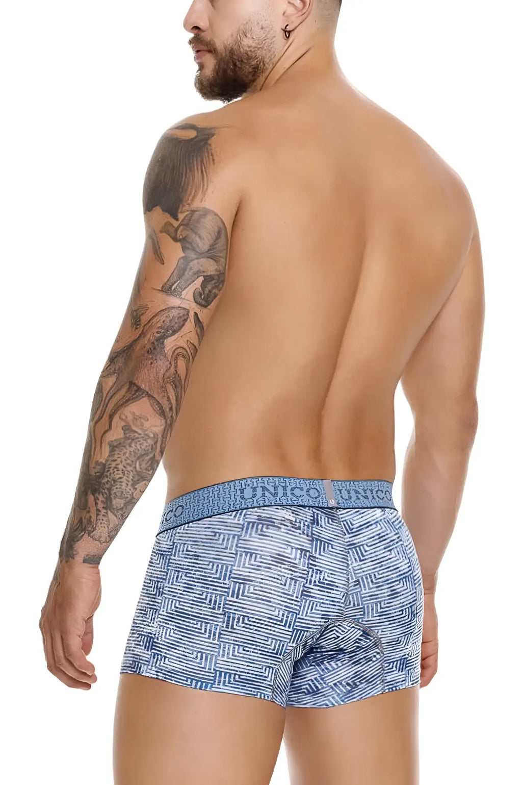 Blue patterned unico ostion trunks with textured geometric design and elastic waistband featuring brand name