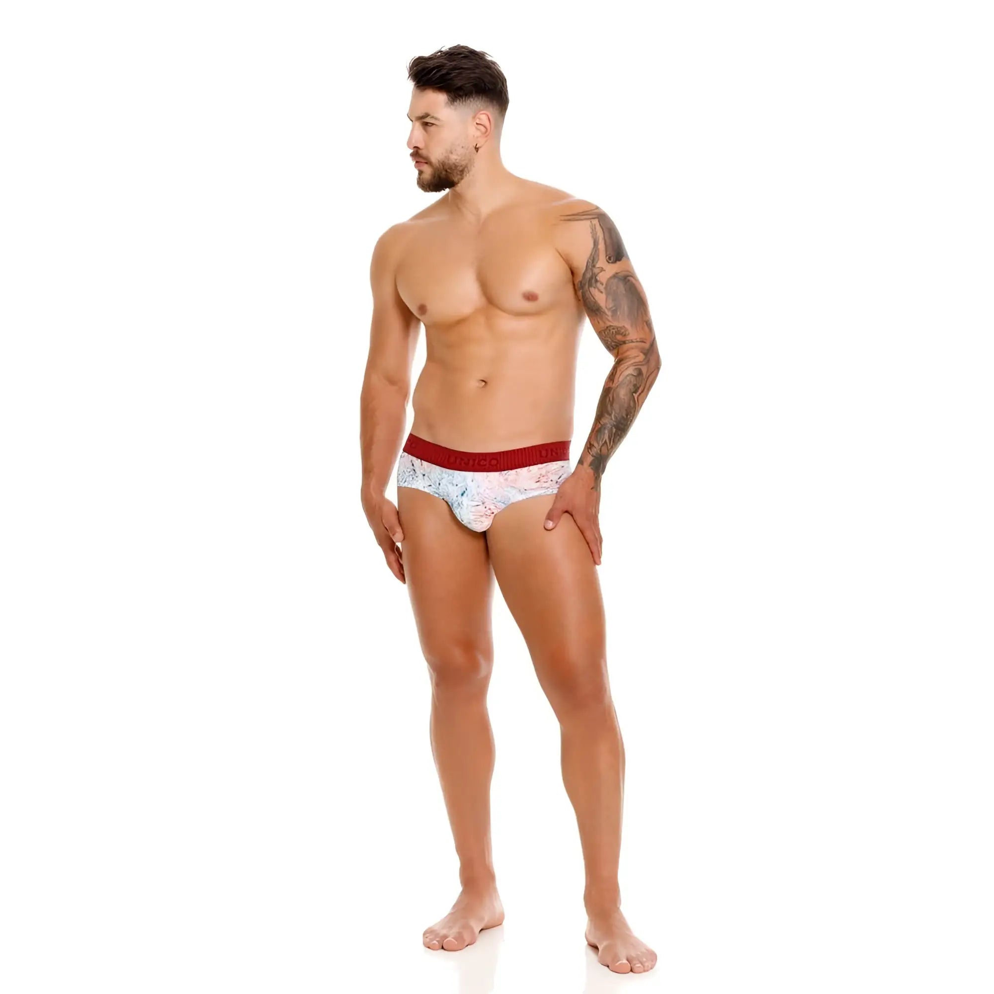 Unico rizo white briefs with a white pattern and red waistband for comfortable everyday wear