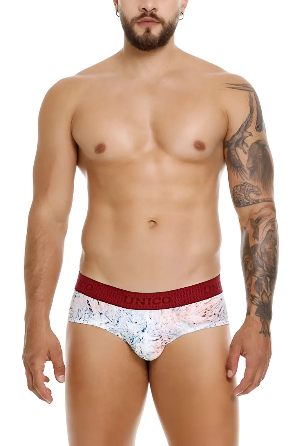 White and red patterned unico 25020101103 rizo briefs with bold red elastic waistband featuring unico logo
