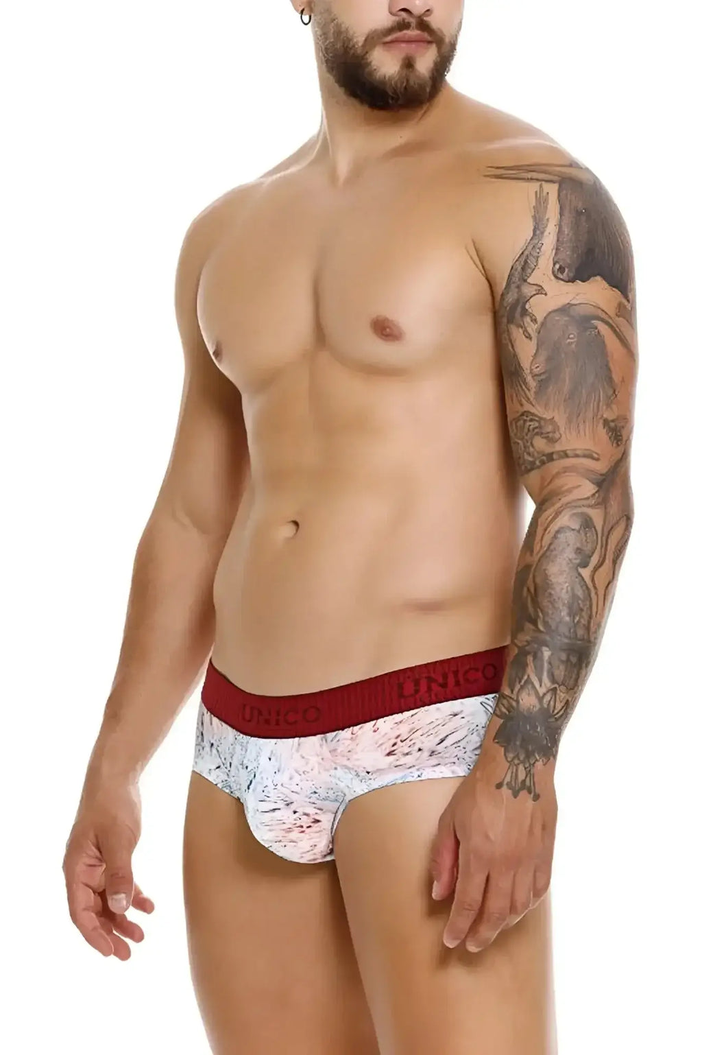 Unico 25020101103 rizo briefs in white with red pattern and bold red waistband featuring unico brand name