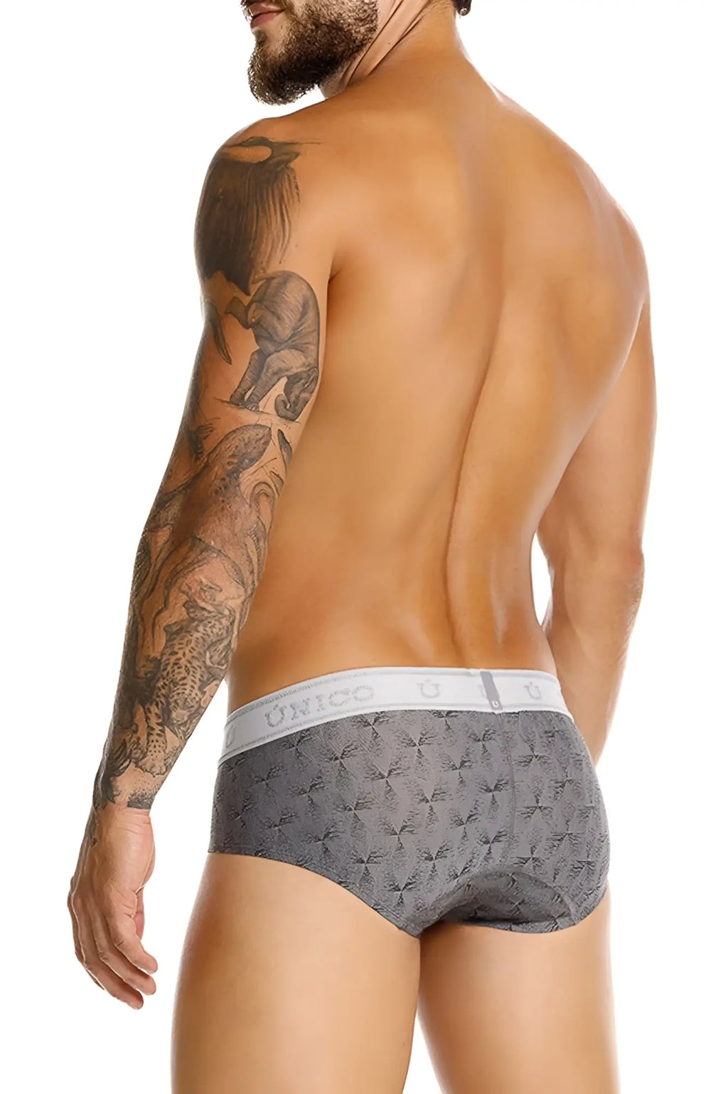 Gray patterned briefs with a white elastic waistband featuring the unico brand name in color 59-gray
