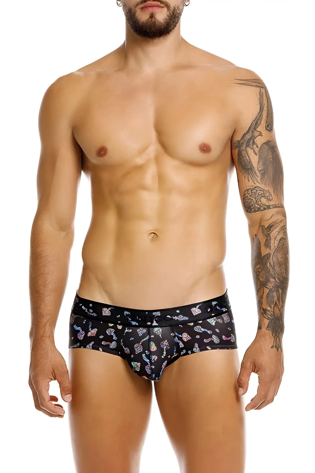 Black men’s briefs unico 25060101103 featuring vibrant multicolored cartoonish mushrooms and stars on black fabric