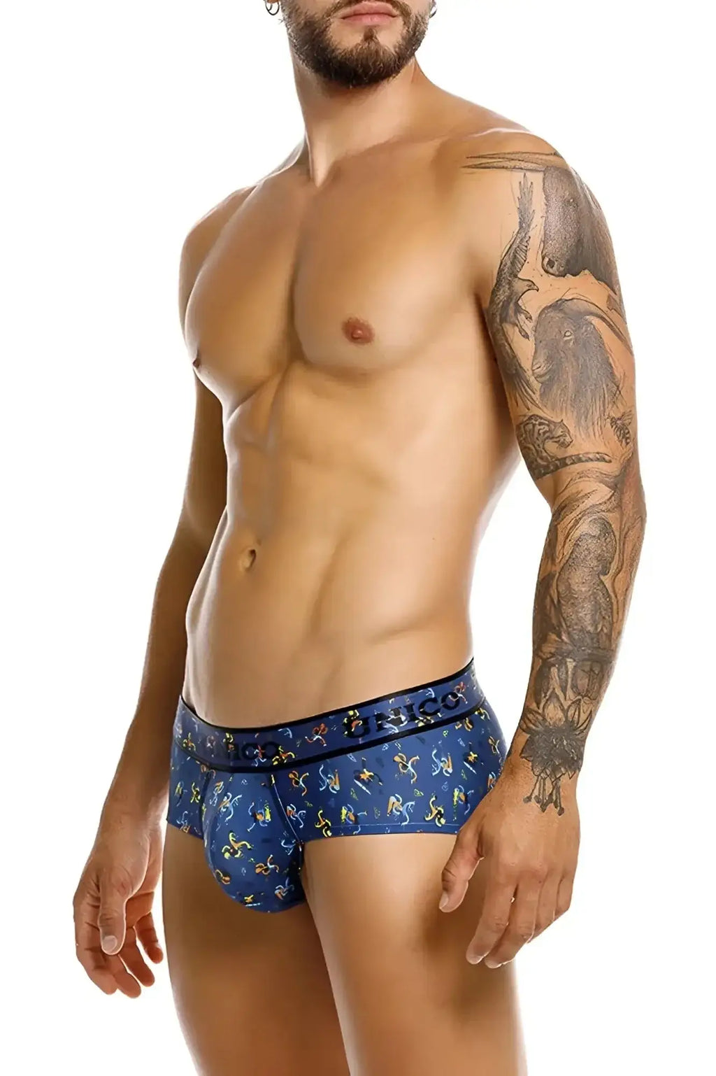 Blue men’s briefs unico 25060101106 pacer briefs with playful yellow and white cartoon pattern and bingo waistband