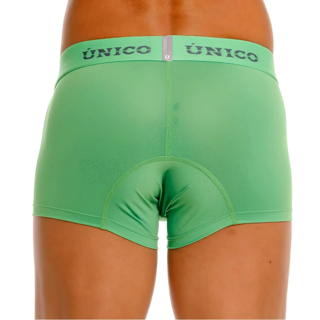Green unico brand men’s cycling briefs with padded seat area and textured fabric in color 43-green shown from back