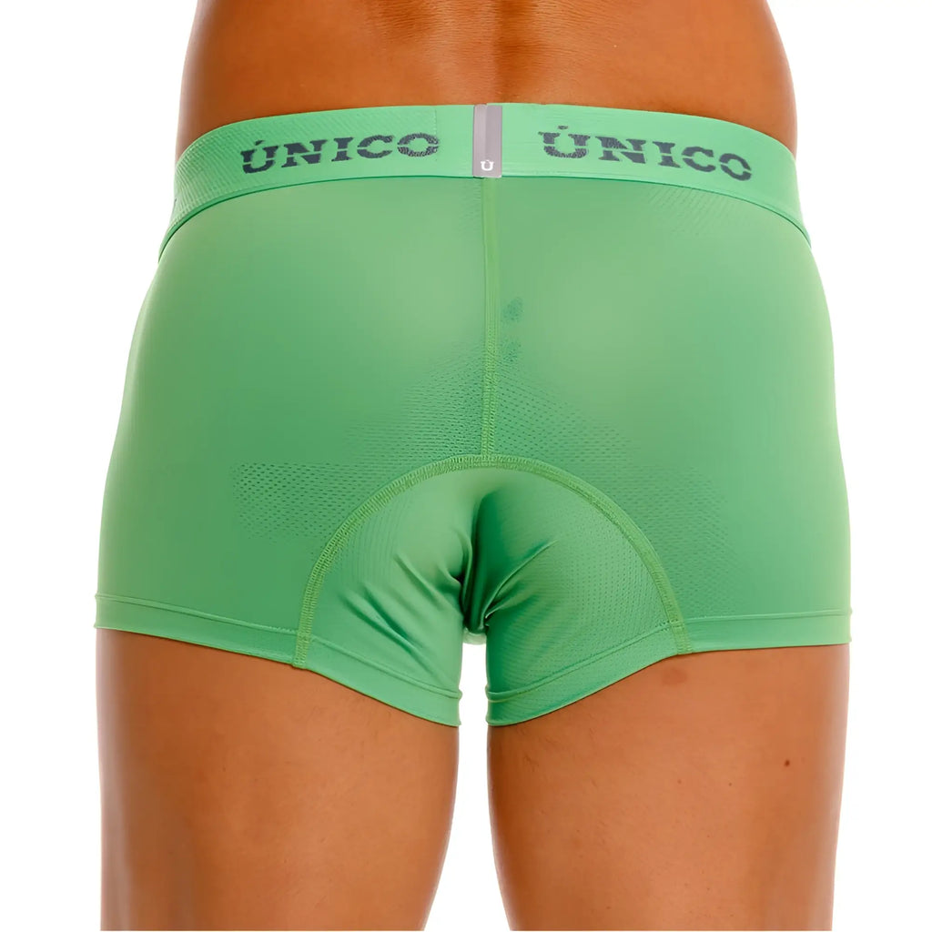 Green unico brand men’s cycling briefs with padded seat area and textured fabric in color 43-green shown from back