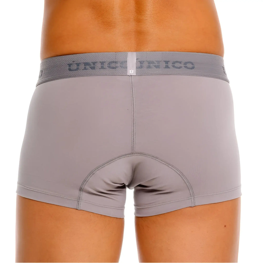 Gray unico ruano trunks with matching elastic waistband featuring brand name in dark gray lettering color 59-gray