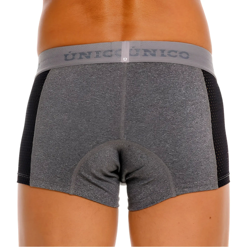 Gray and black unico brio men’s cycling shorts with textured fabric perforated panels and elastic logo waistband