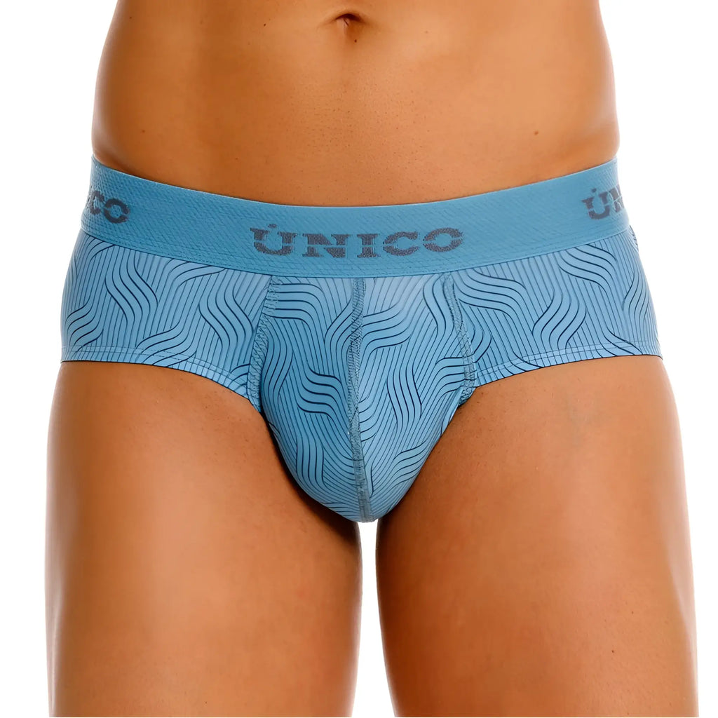 Light blue unico men’s Lenoso briefs with a subtle wave pattern across the fabric in color 46-Blue