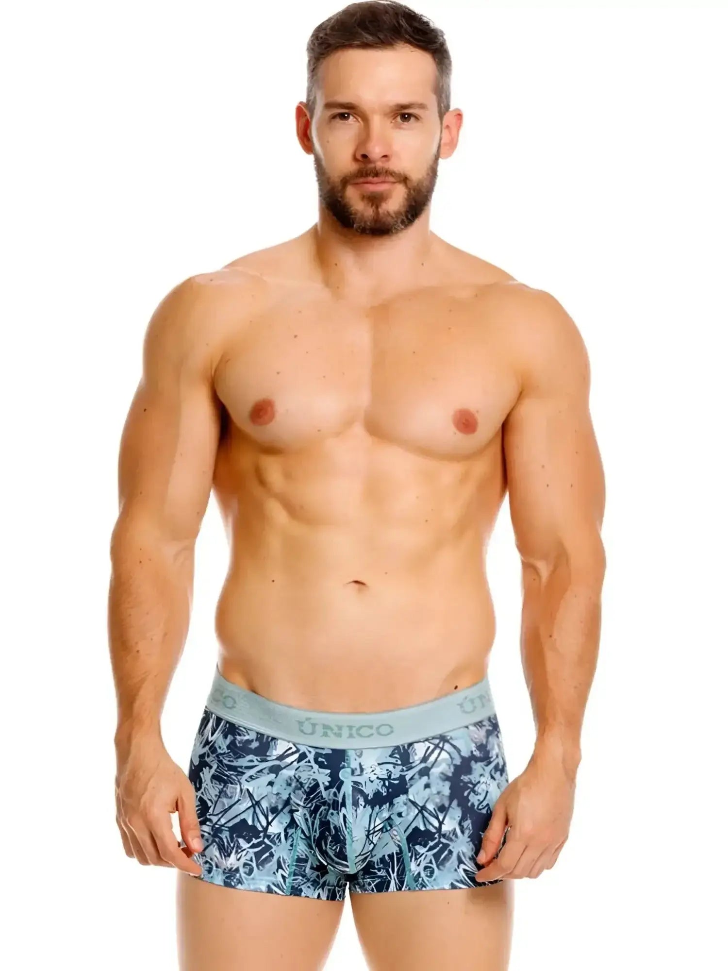 Front view of Unico 26040100112 blue trunks on a model.