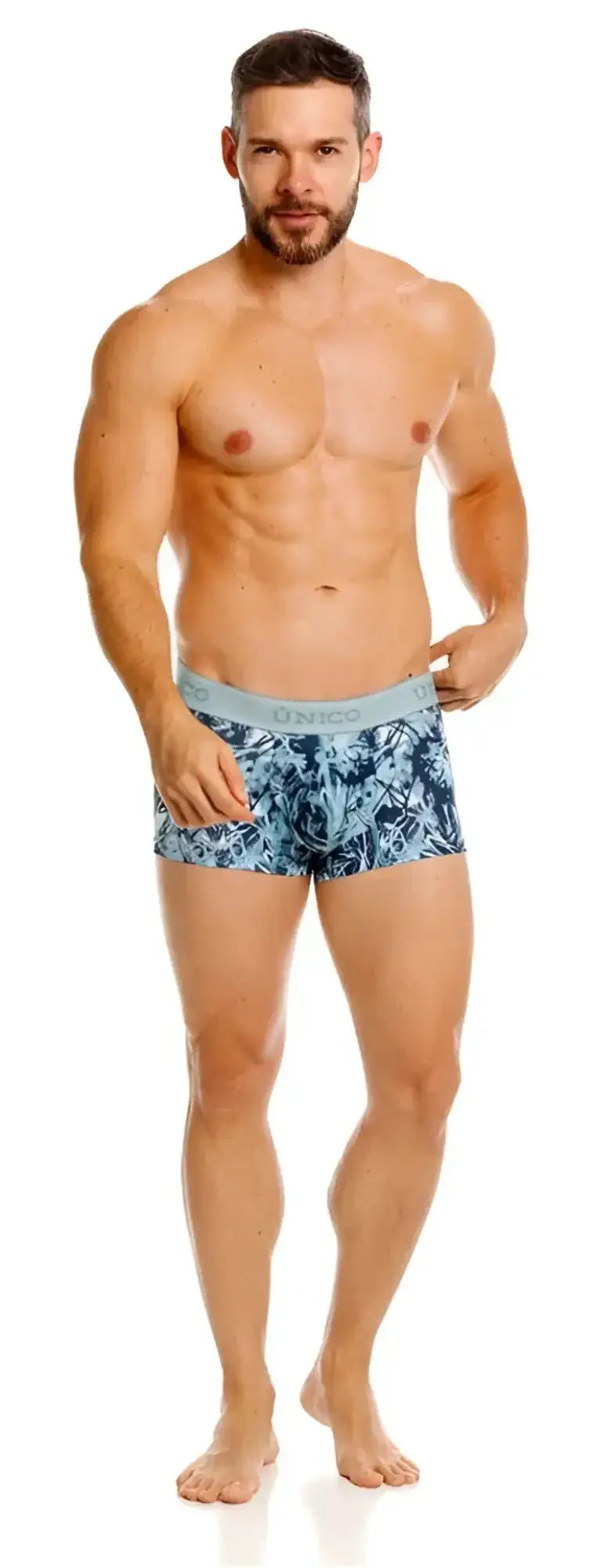 Unico 26040100112 blue trunks on a model, front view studio shot.