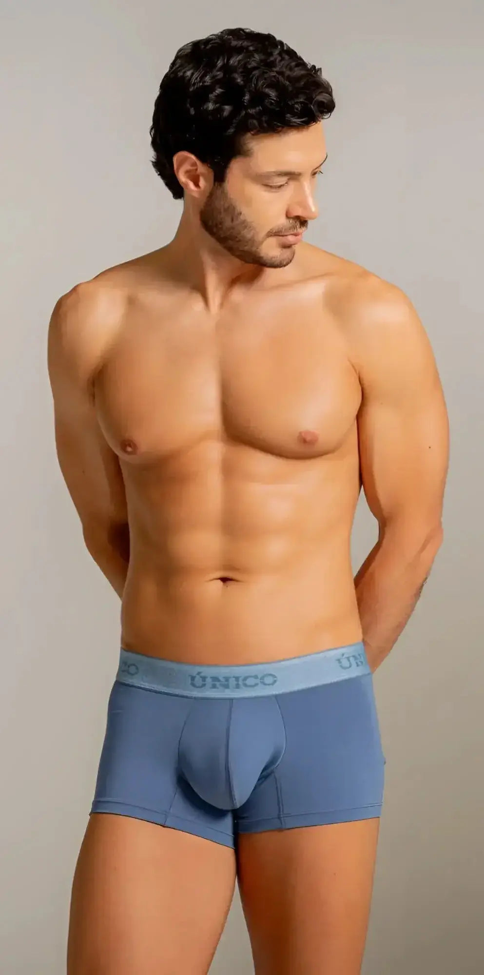 Unico Classic Trunks in Teal: Lifestyle shot featuring a model wearing the premium men’s everyday essential.