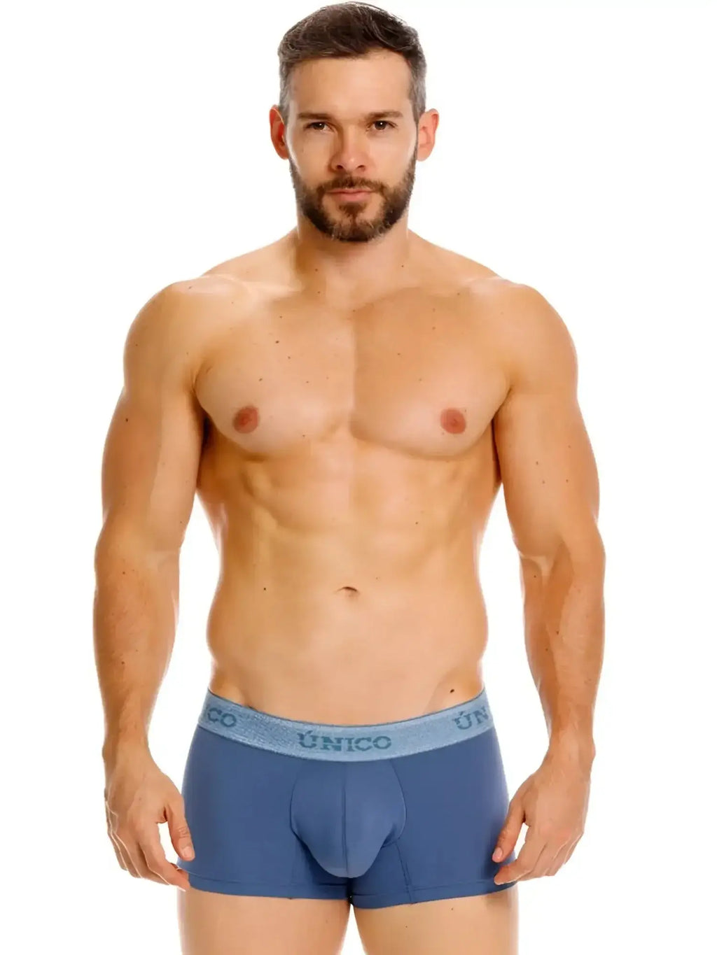 Front view of Unico 26040100117 Classic Trunks in Teal worn by a model.