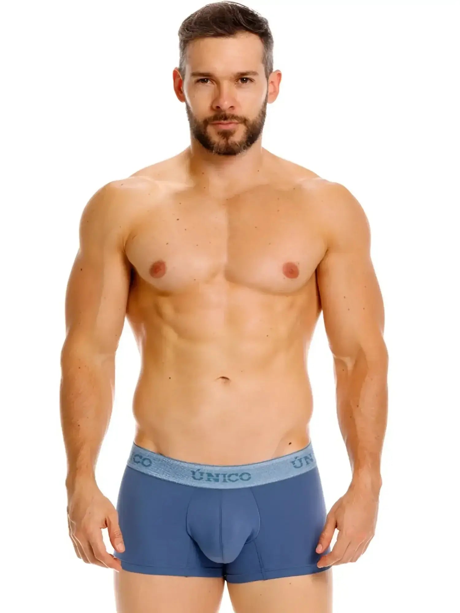 Front view of Unico 26040100117 Classic Trunks in Teal worn by a model.