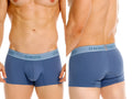 Unico Classic Trunks in Teal, showing front and back views on a model.