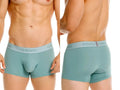Front and back view of Unico Ceramic Trunks in green on a male model.