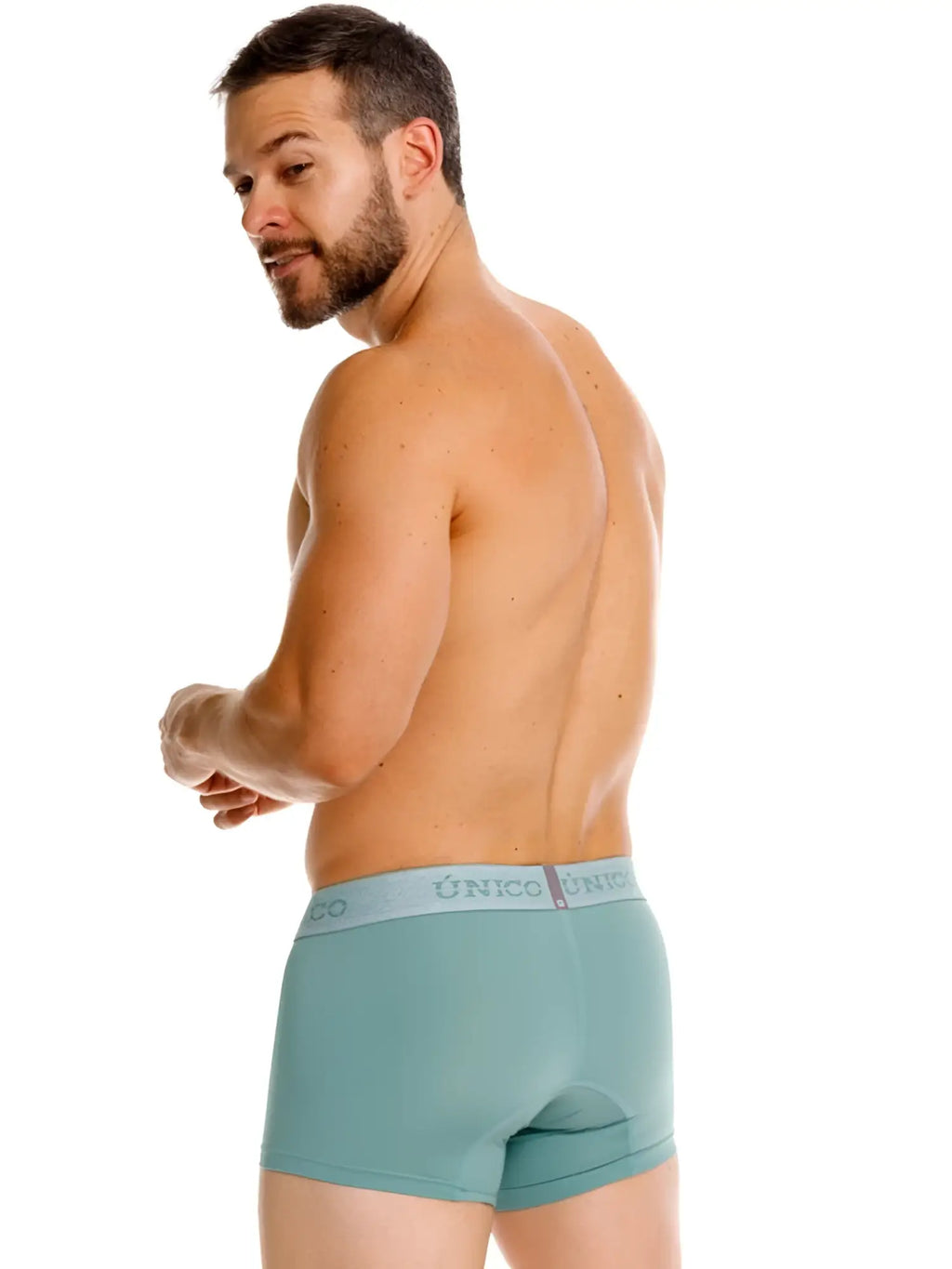 Unico Ceramic Trunks in green, lifestyle back view showing the fit on a model.