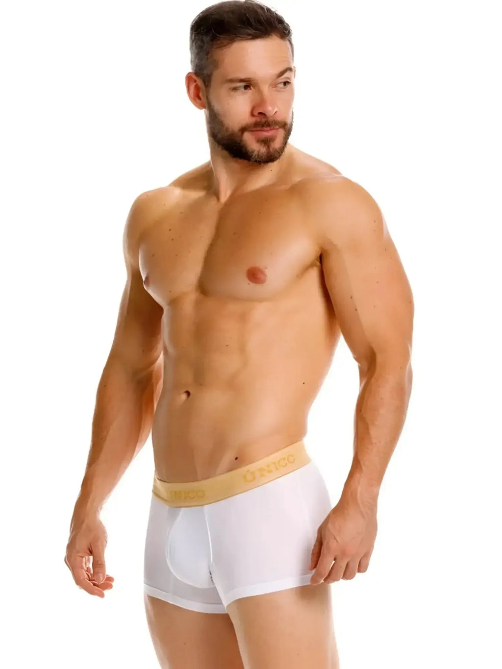 Unico Amber trunks in white, premium athletic fit, shown in a front lifestyle shot on a model.