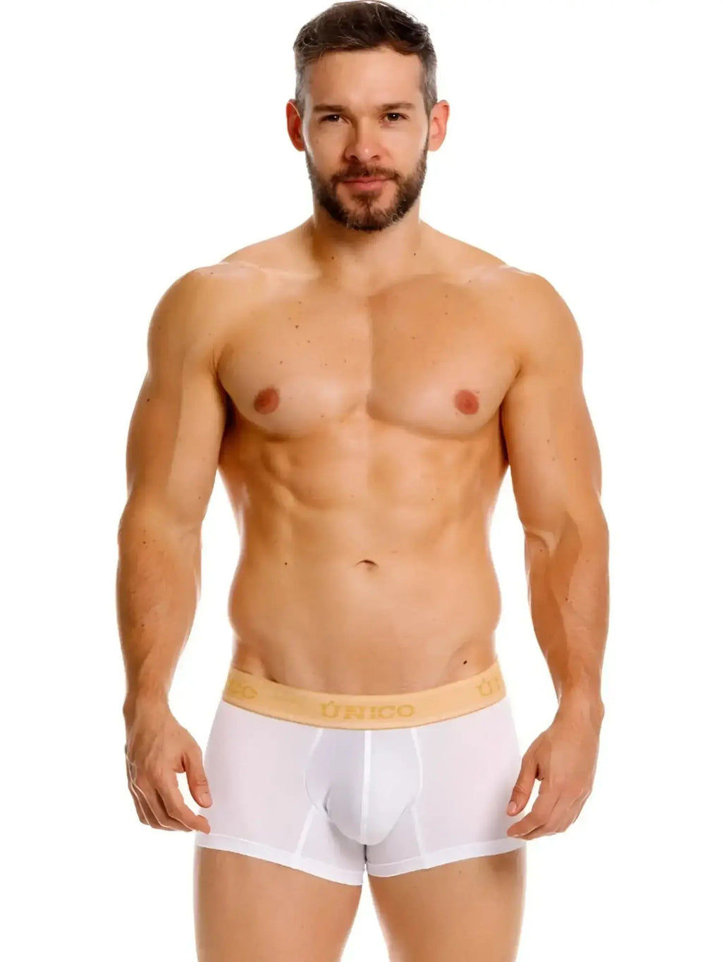 Front view of Unico Amber trunks in white on a male model.