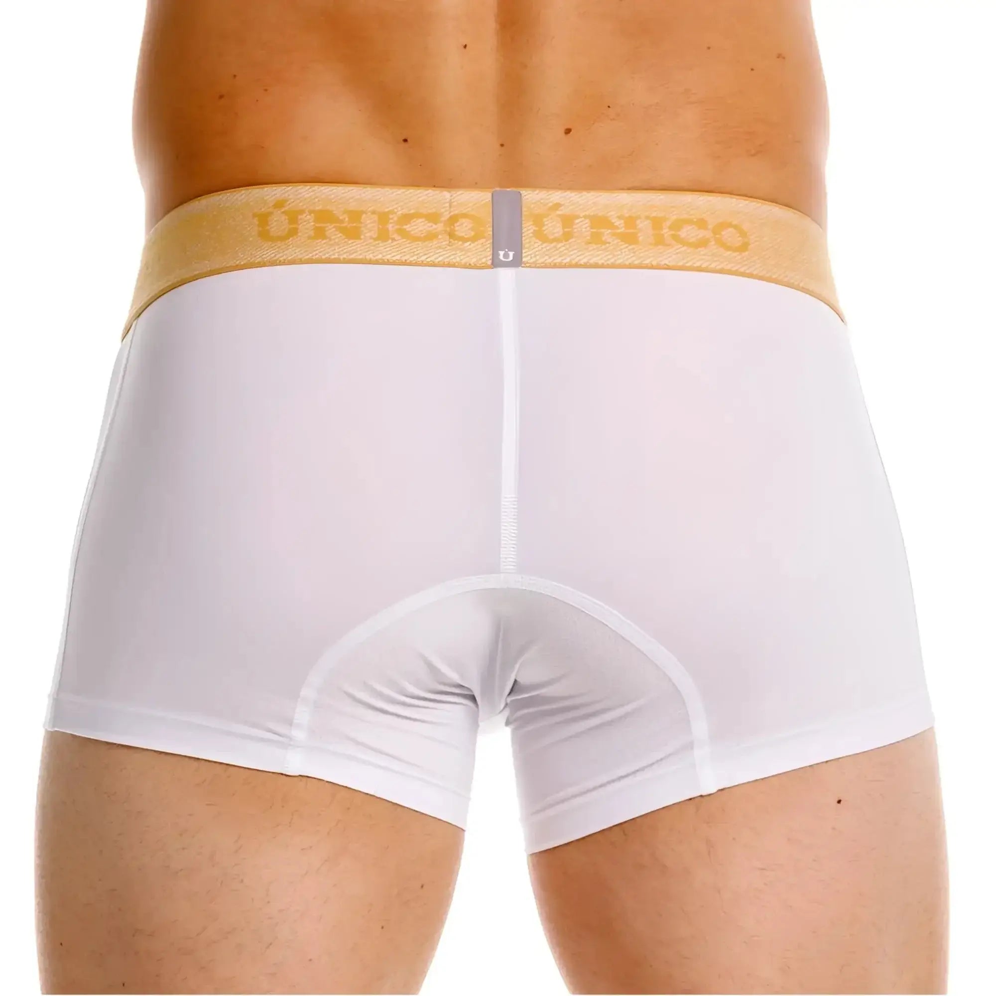 Unico Amber trunks in white, back view showing the athletic fit and elastic logo waistband.