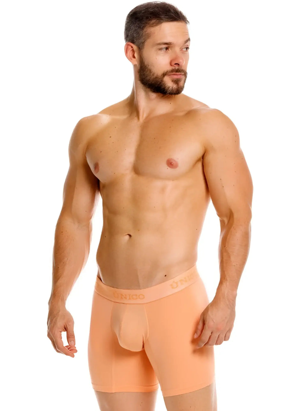 Unico Classic Boxer Briefs in apricot, shown on a model in a front view lifestyle shot.