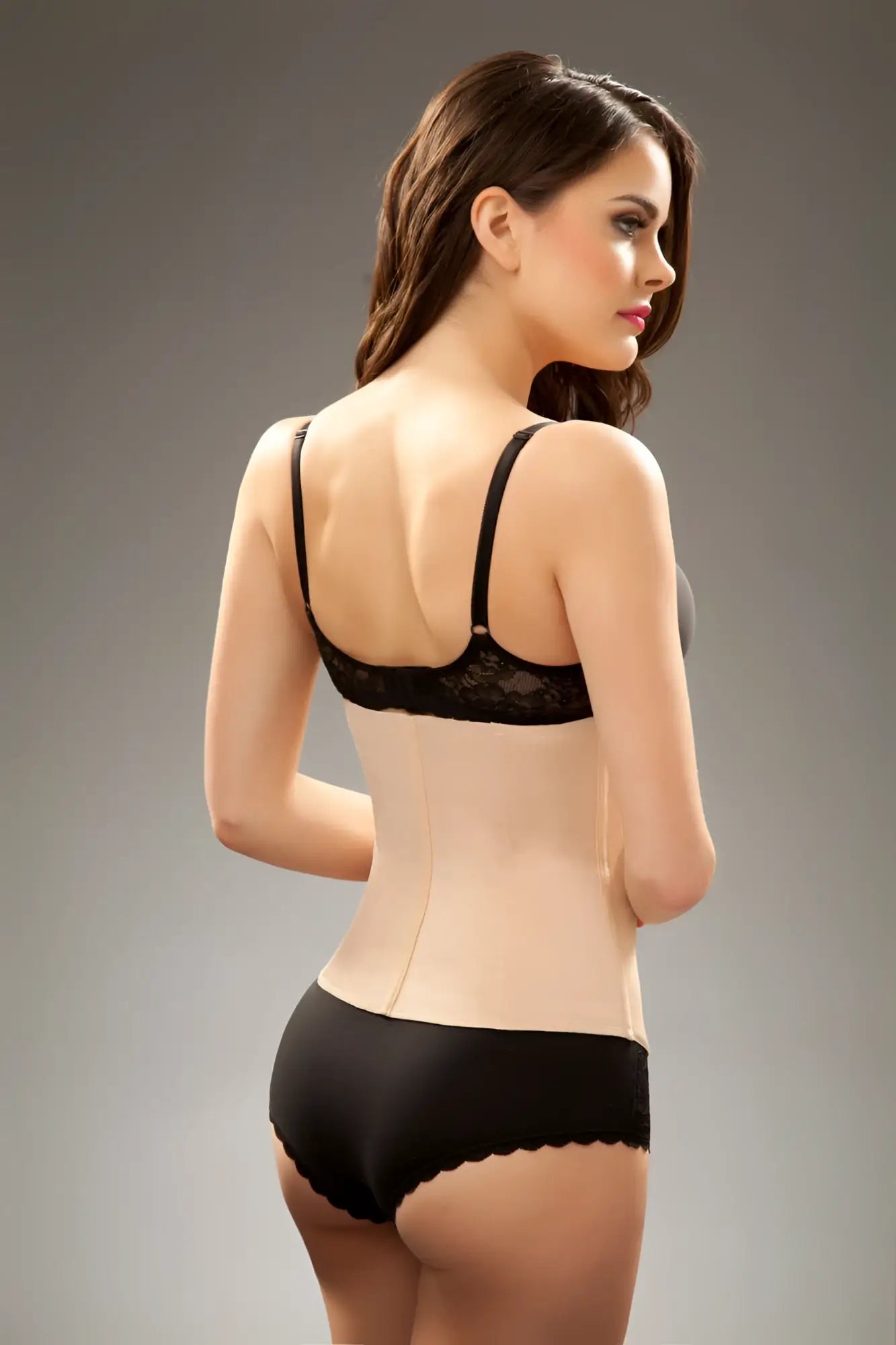 Black lace bra with adjustable straps and seamless form fitting bodice in nude vedette 403 gigi waist cincher with zipper