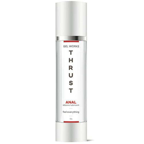 A sleek transparent bottle of wet stuff gel works thrust silicone anal lubricant with silver cap and red accents