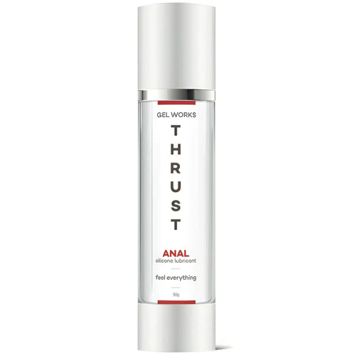 A sleek transparent bottle of wet stuff gel works thrust silicone anal lubricant with silver cap and red accents