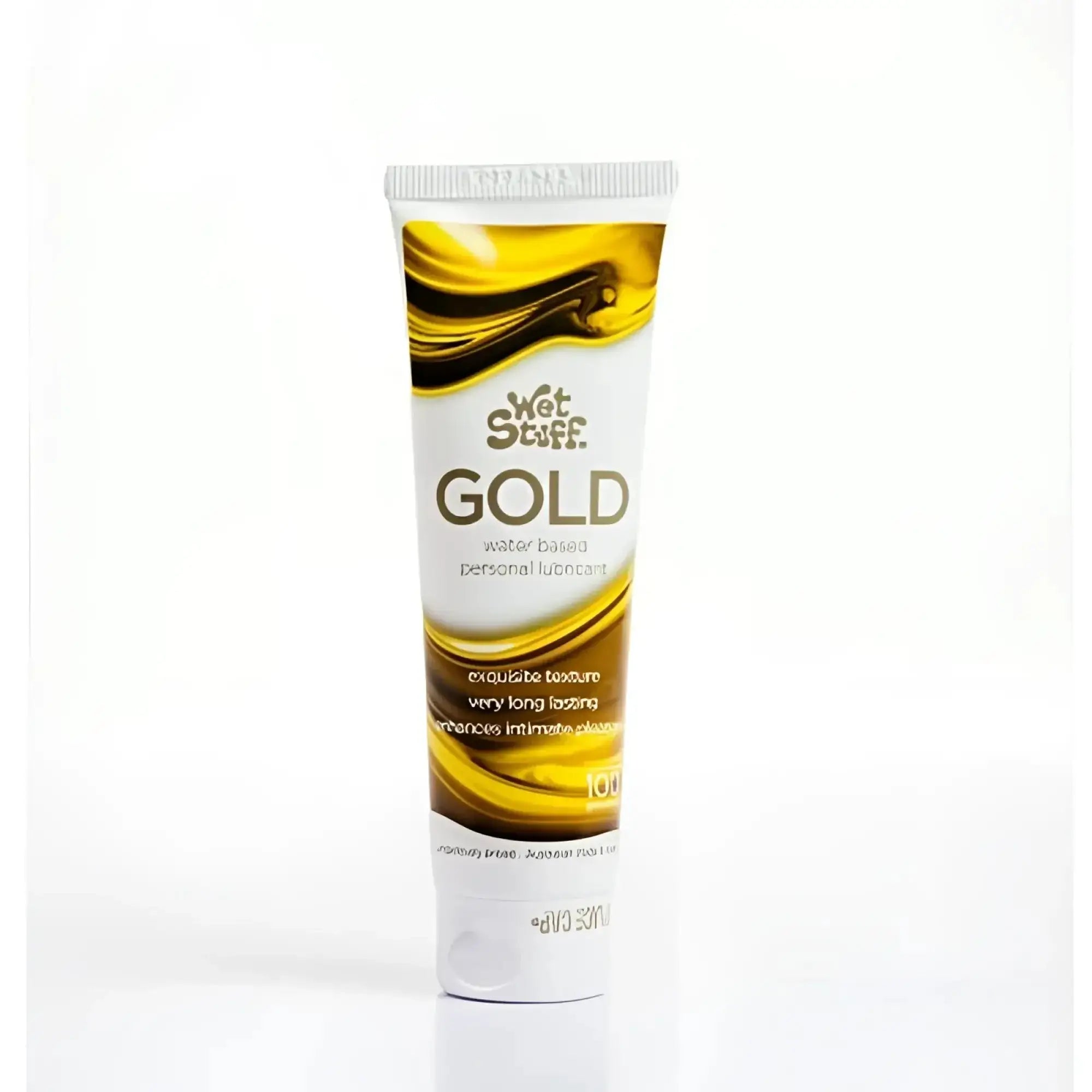 A sleek white tube of wet stuff gold water-based personal lubricant with a glossy gold and black wave label design