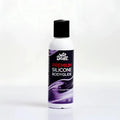 A white bottle with black cap and purple label of Wet Stuff premium silicone bodyglide disc top 125g product