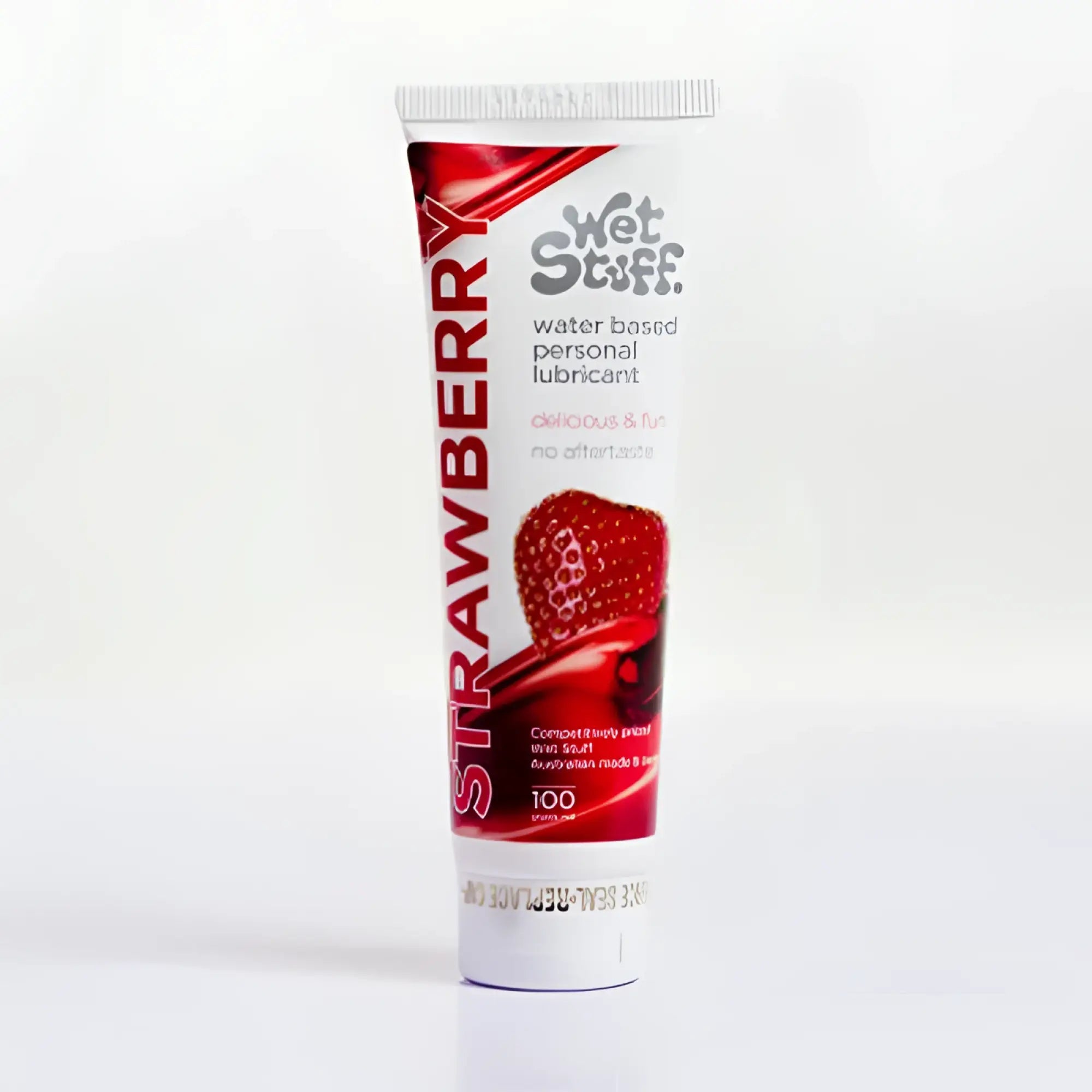 Red and white tube of wet stuff strawberry water-based personal lubricant 100g for smooth intimate use