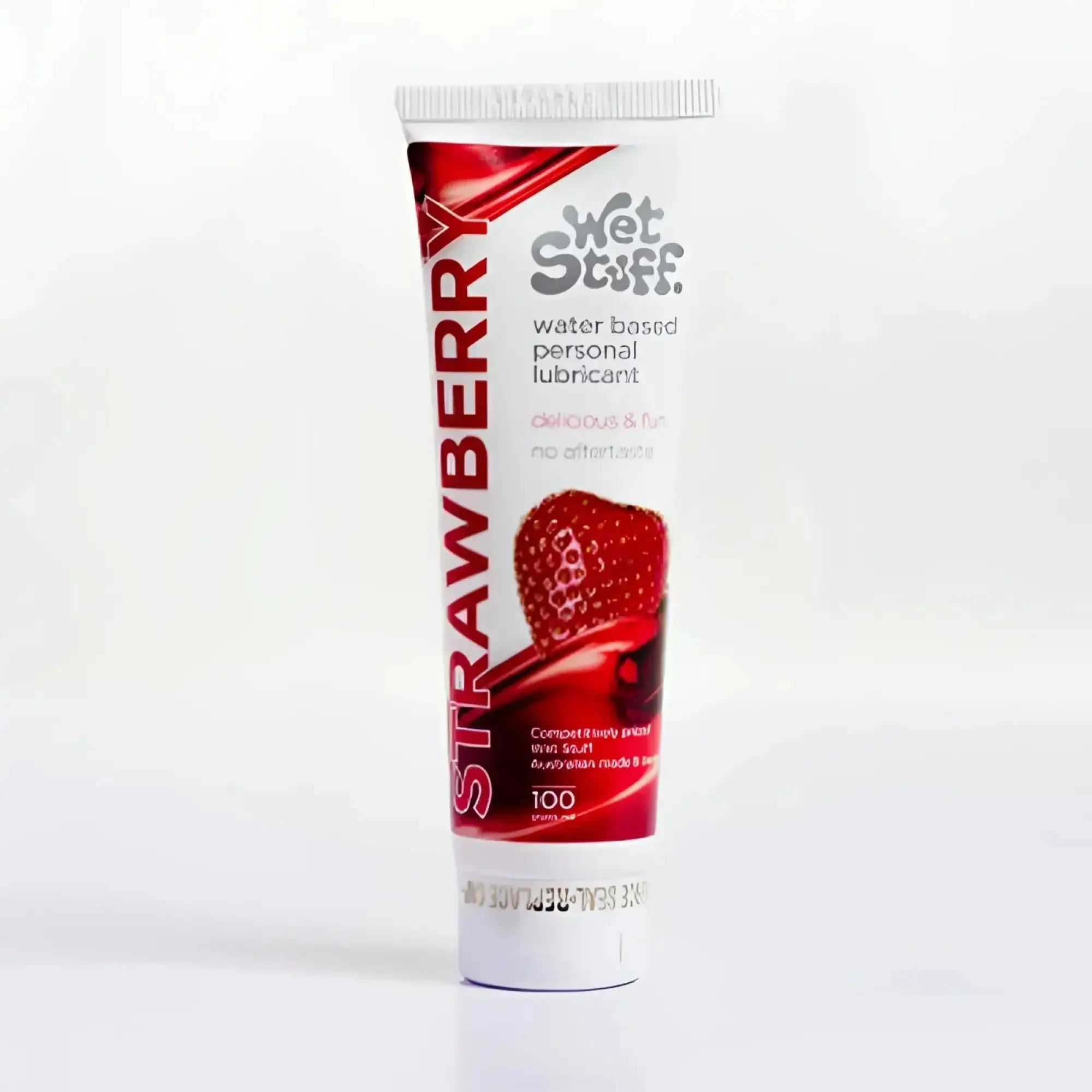 Red and white tube of wet stuff strawberry water-based personal lubricant 100g for smooth intimate use