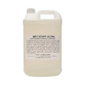 A translucent white plastic jug with gray cap and handle containing wet stuff ultra water based personal lubricant 5kg