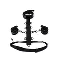 Black leather bondage set with decorative patterned cuffs and central strap from whipsmart whip smart diamond body restraint