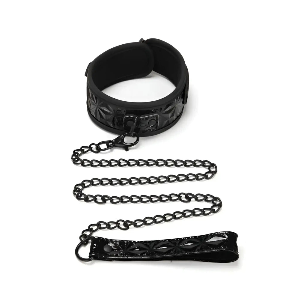 Black leather Whip smart diamond collar with embossed floral pattern and matching chain leash