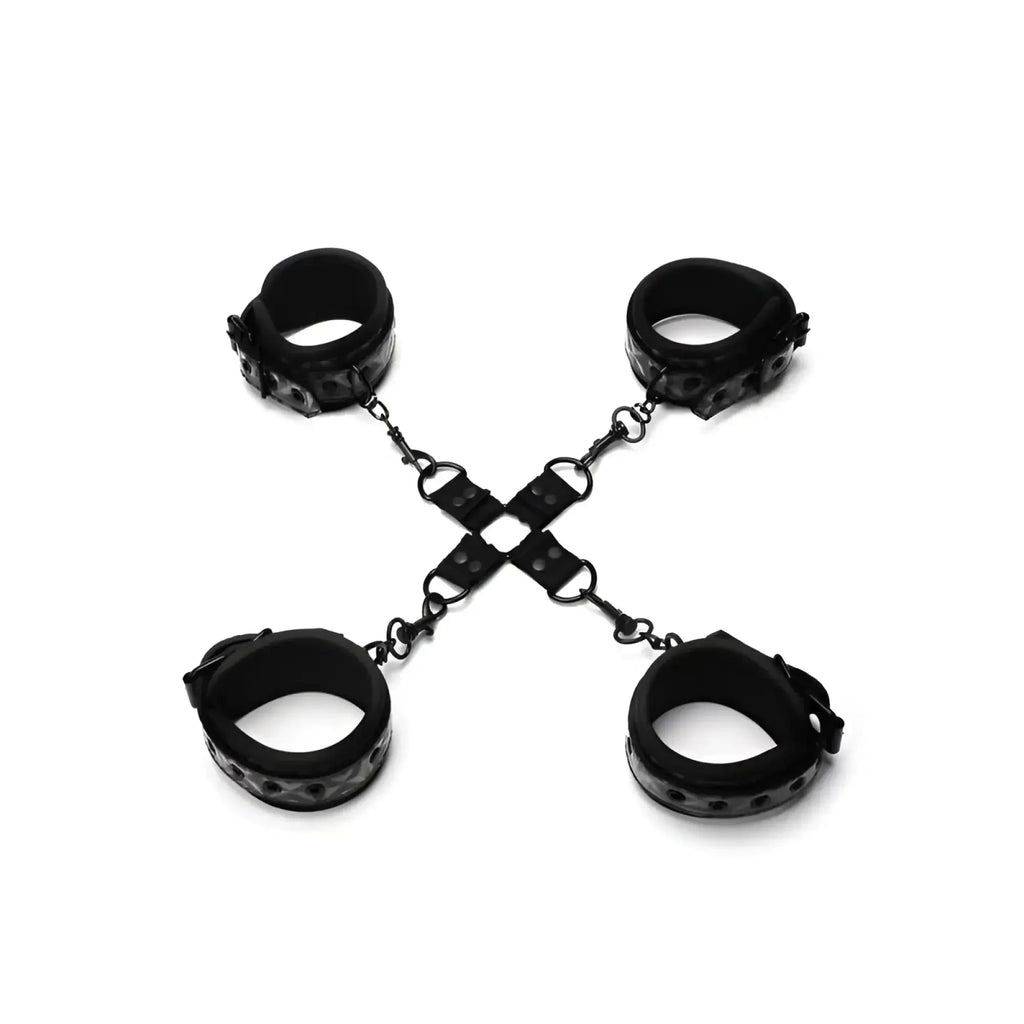 Black leather wrist and ankle cuffs connected by chain in x-shape whip smart diamond hogtie restraint black