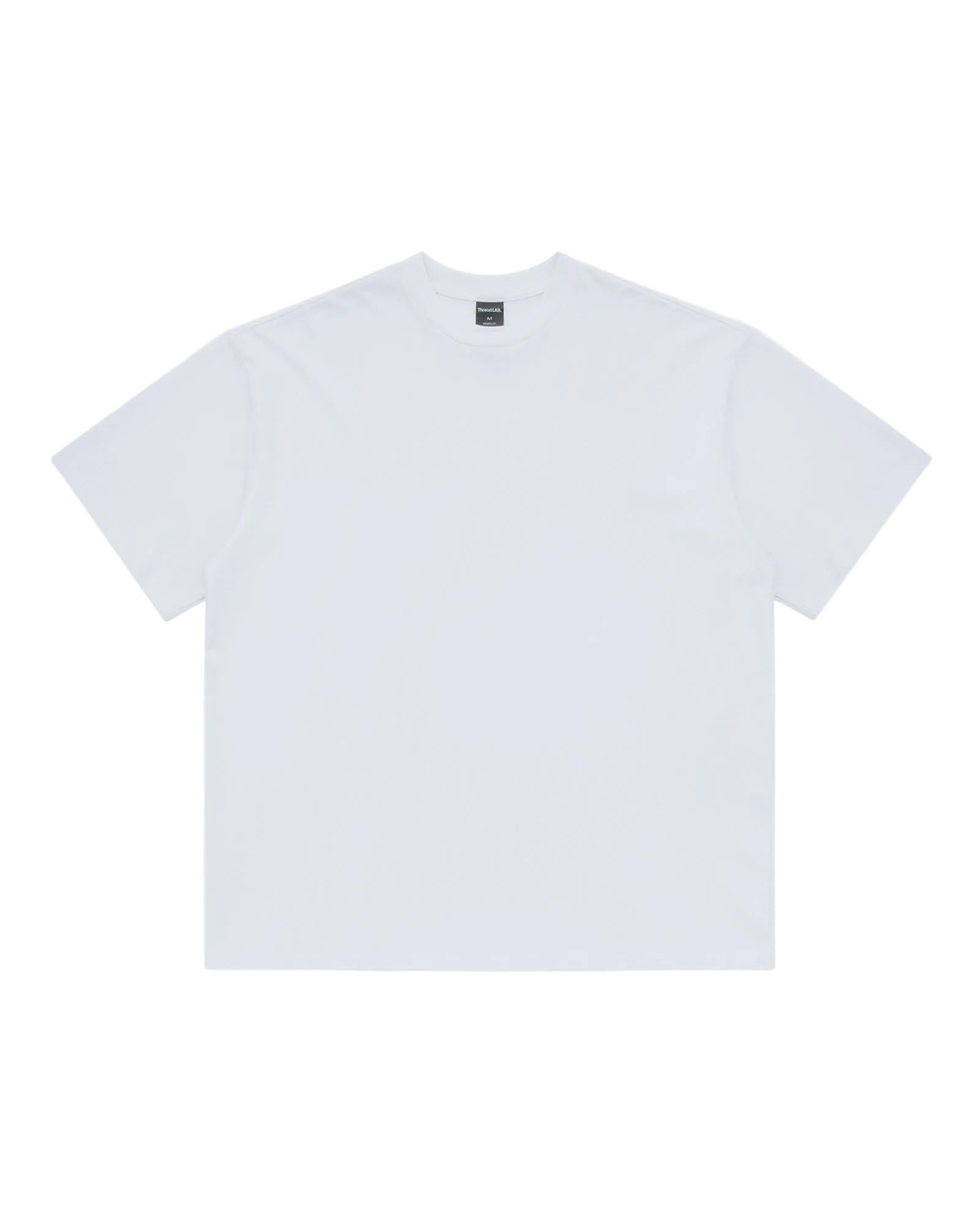 Minimalist white premium crewneck tee with a relaxed fit and a black interior neck label.