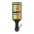 Black leather paddle wood rocket paddle with bold gold foil lettering reading fuck you across the surface