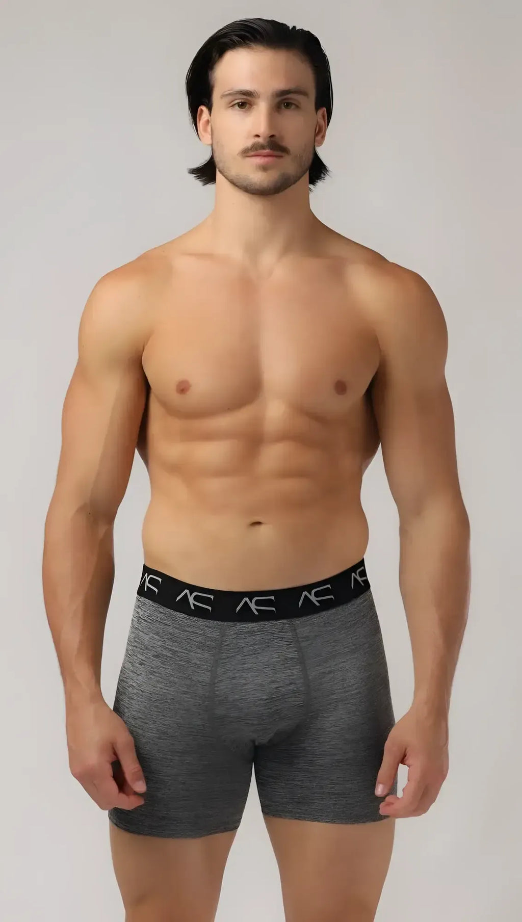 Gray heathered boxer briefs workout trunks with black ac logo waistband designed for active use and comfort